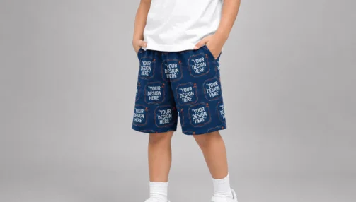 kid wearing your design here printed sports short qikink